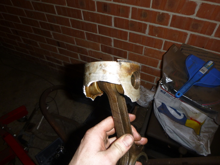 Smashed piston side view