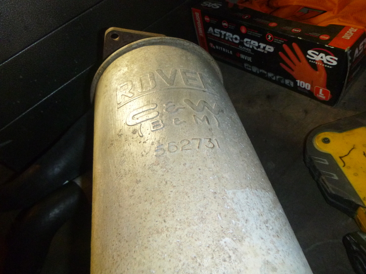 Exhaust silencer displaying "ROVER" stamping