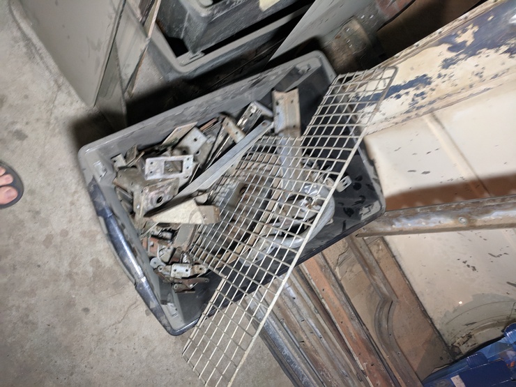 Bucket of smaller galvanised parts; top view