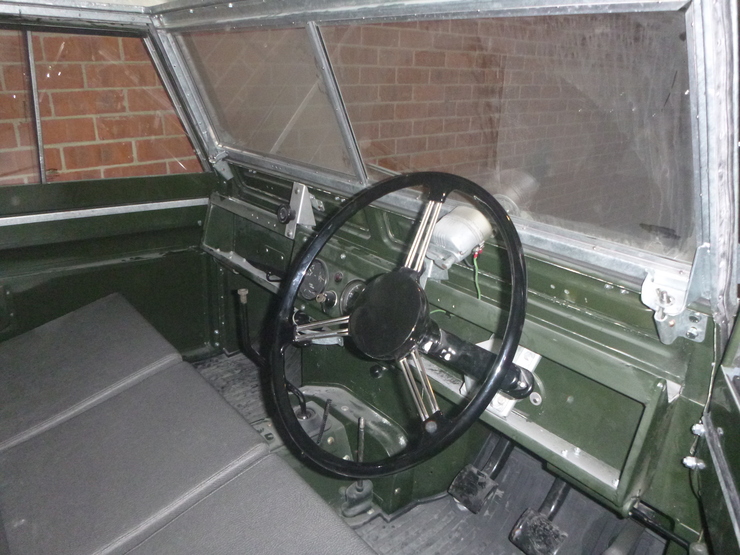 Steering wheel mounted inside cabin