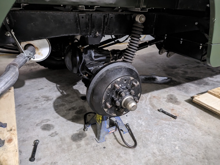 Shot of rear driver's side axle with wheel and leaf spring missing