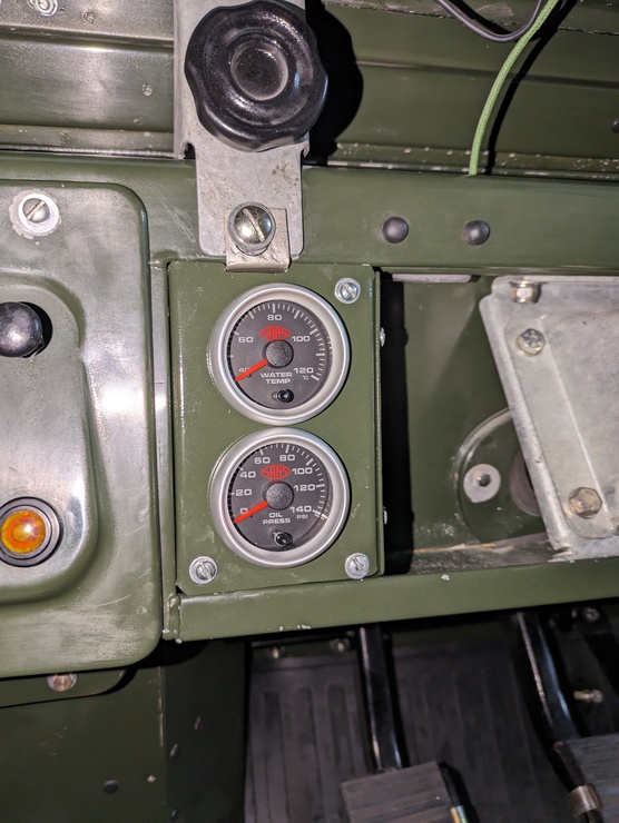 Interior of car showing water and oil gauges