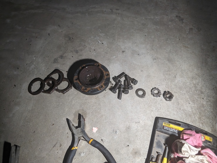 Driving flange and hub nuts in disassembly order